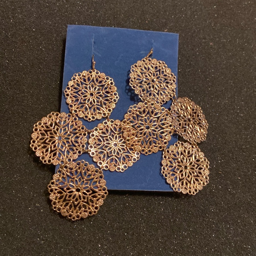 Beautiful gold earrings by Avon